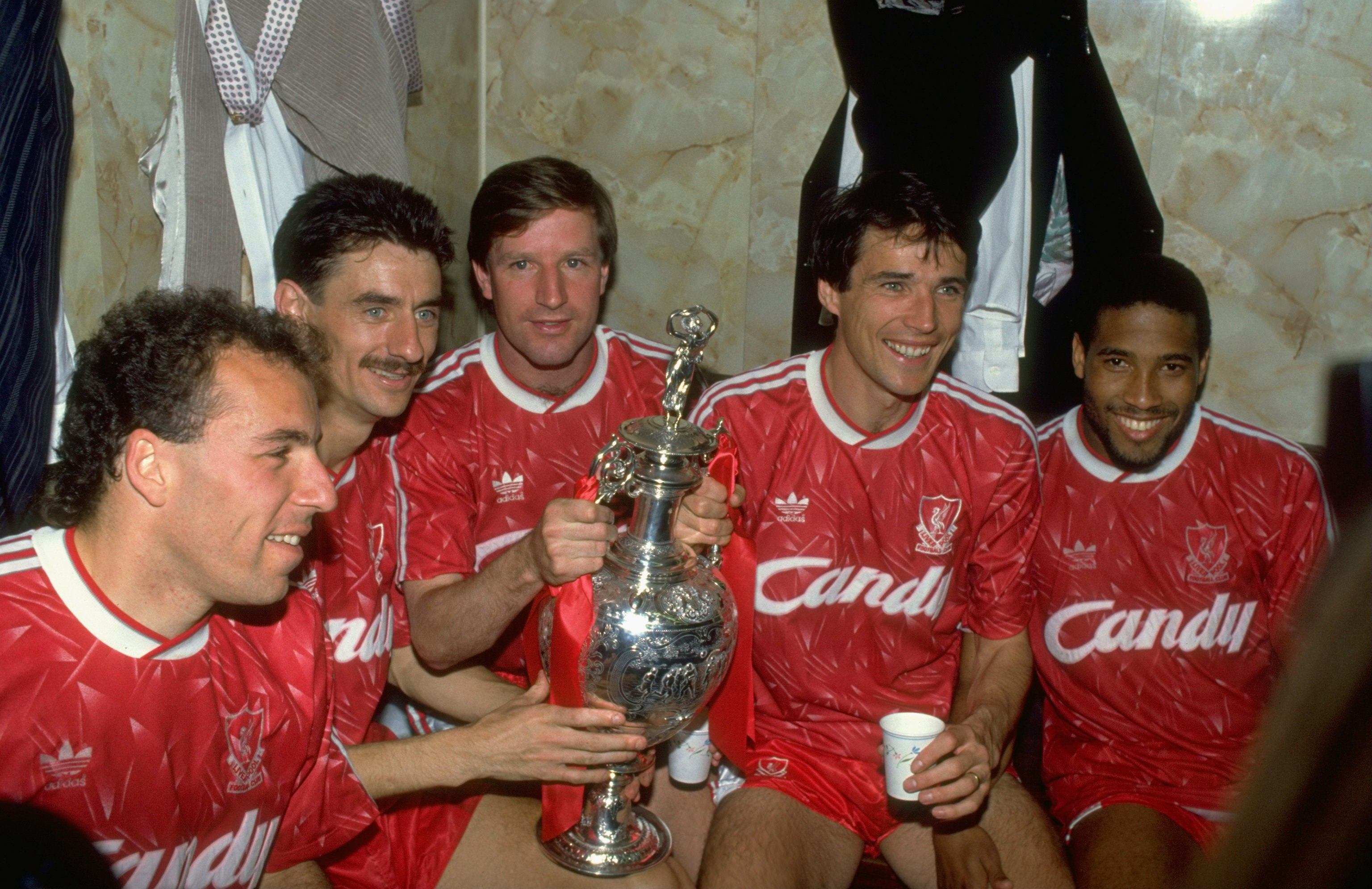 1 May 1990: (L-R) Ronnie Rosenthal, Ian Rush, Ronnie Whelan, Alan Hansen and John Barnes of Liverpool celebrate after the Barclays League Division One match against Derby County at Anfield in Liverpool, England. Liverpool won the match 1-0 and became league champions. Mandatory Credit: Dan Smith /Allsport